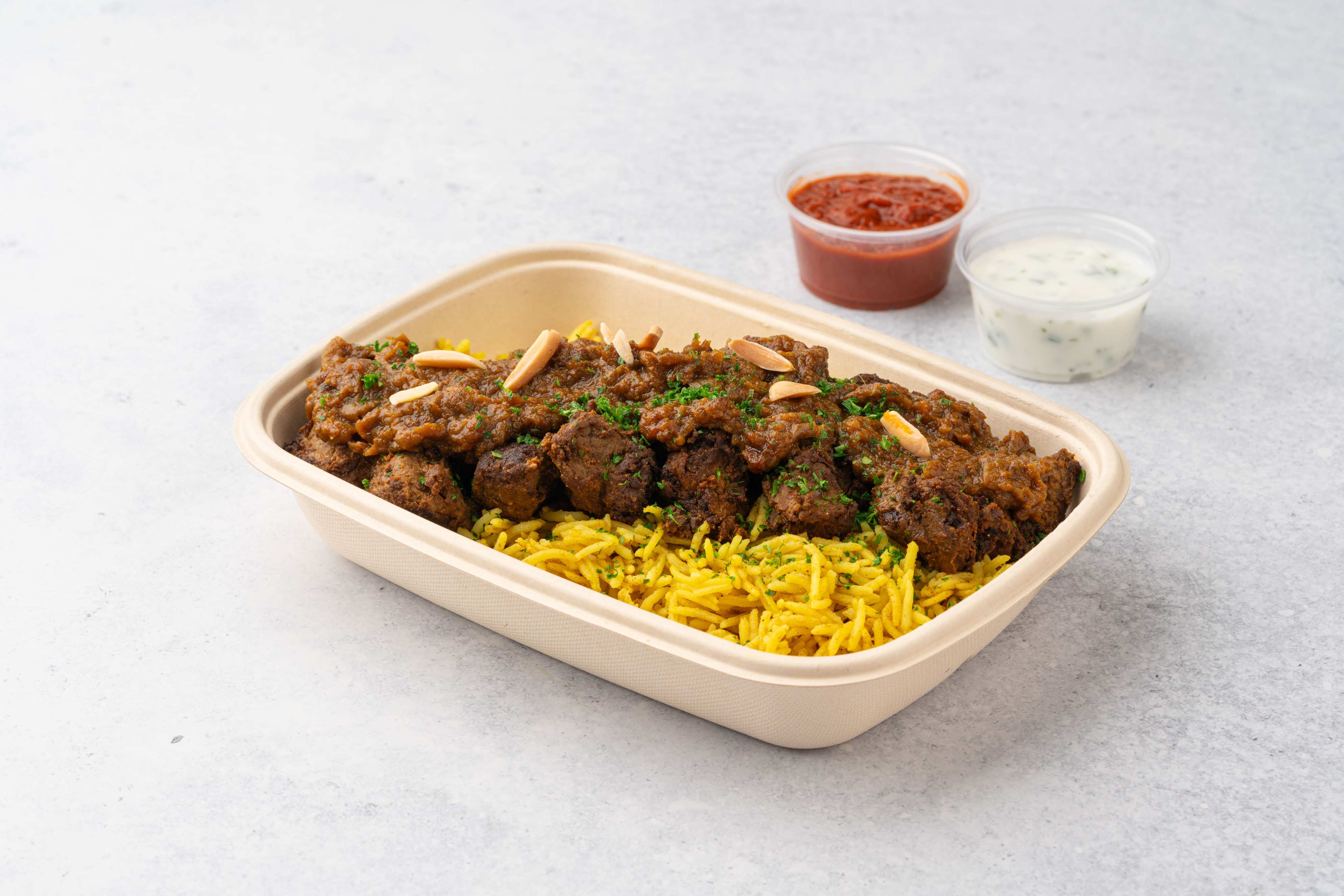Beef Majboos With Yogurt Sauce